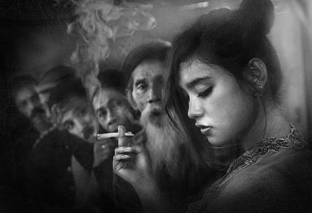 Pensive Woman with Smoke by Sebastian Kisworo — canvas wall art