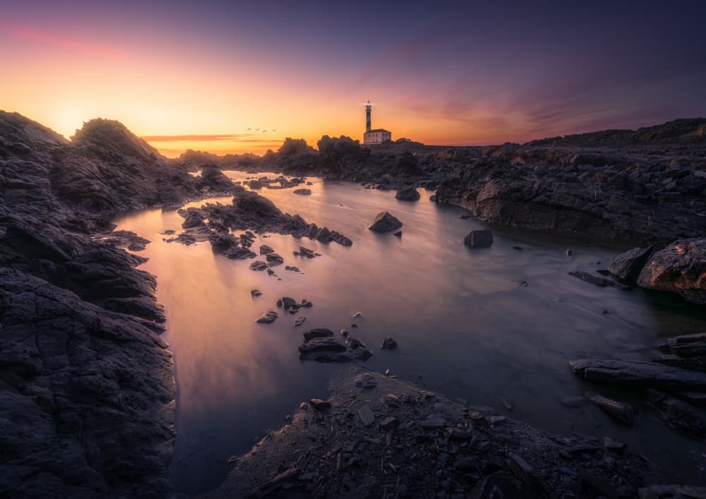 Coastal Lighthouse Sunset by joanaduenas — canvas wall art