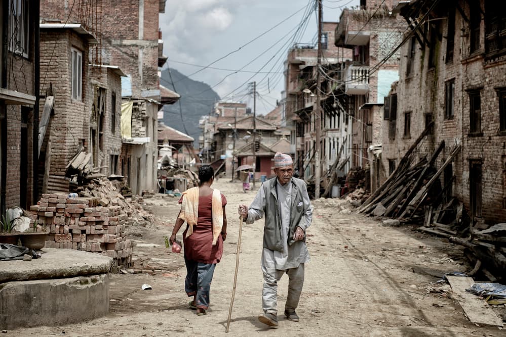 Elderly Man Village Street by Mohammed Al Sulaili — canvas wall art