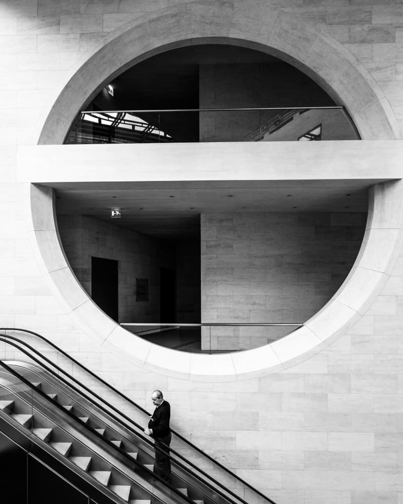 Man on Modern Escalator by Sofie Steenhoudt — canvas wall art
