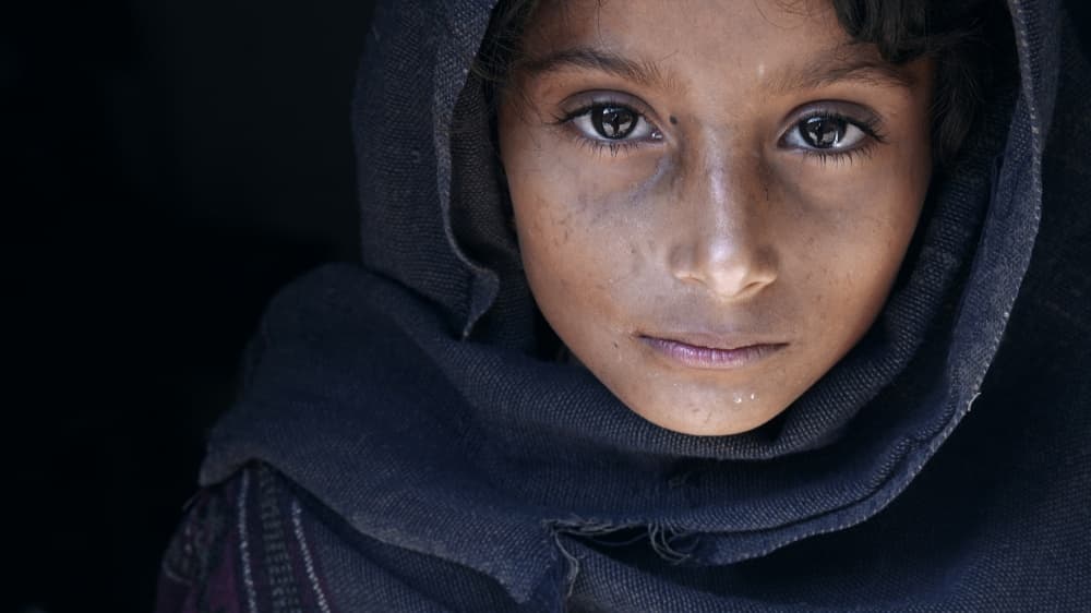 Solemn Girl Portrait by Mohammed Baqer — canvas wall art