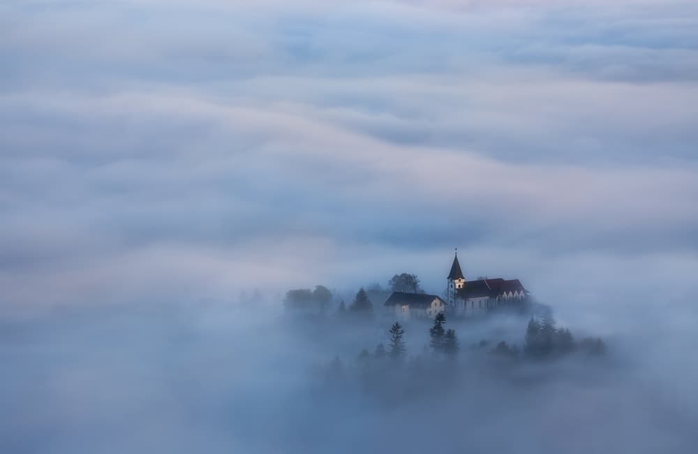 Church in the Clouds by Tomasz Rojek — canvas wall art