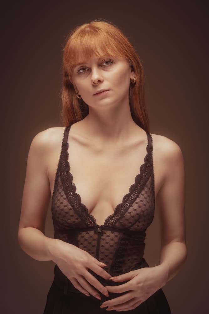 Pensive Redhead Portrait by Dariusz Budyta — canvas wall art