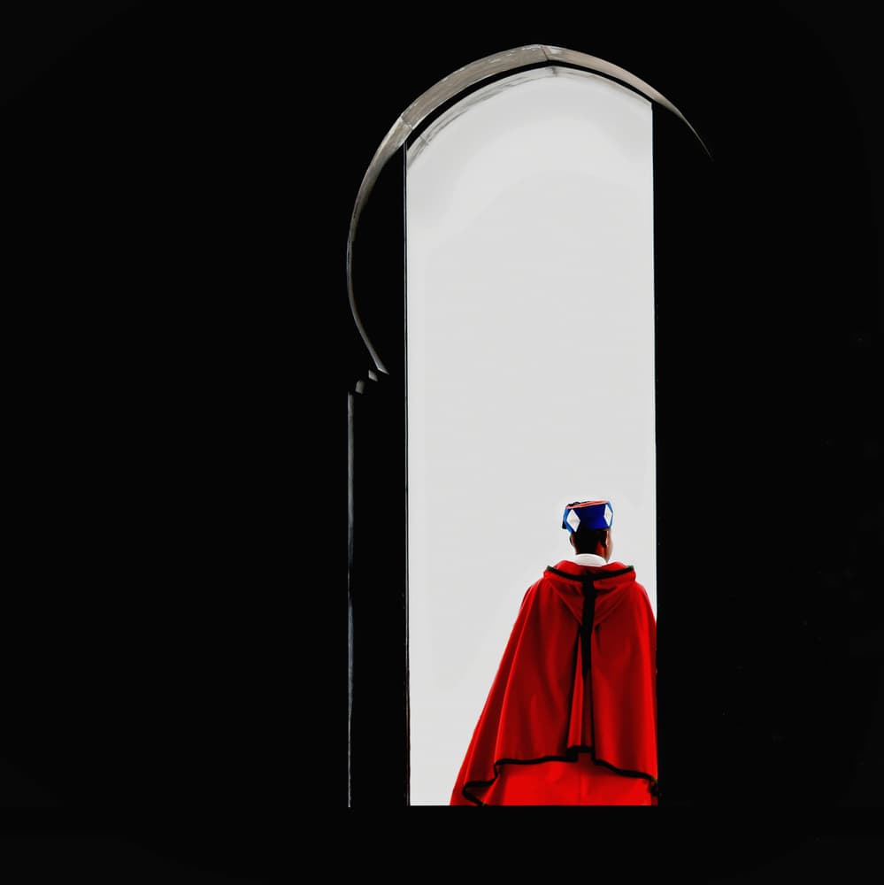 Man In Red Archway by Patrick Compagnucci — canvas wall art