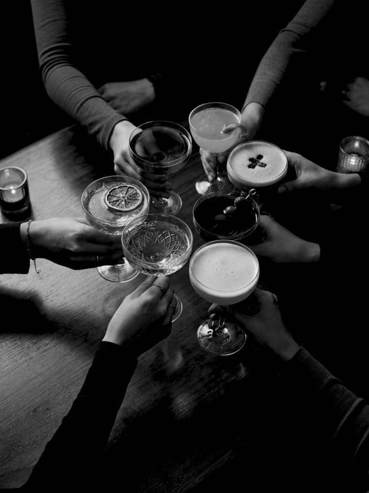 Friends Toasting Cocktails by Andreas Magnusson — canvas wall art