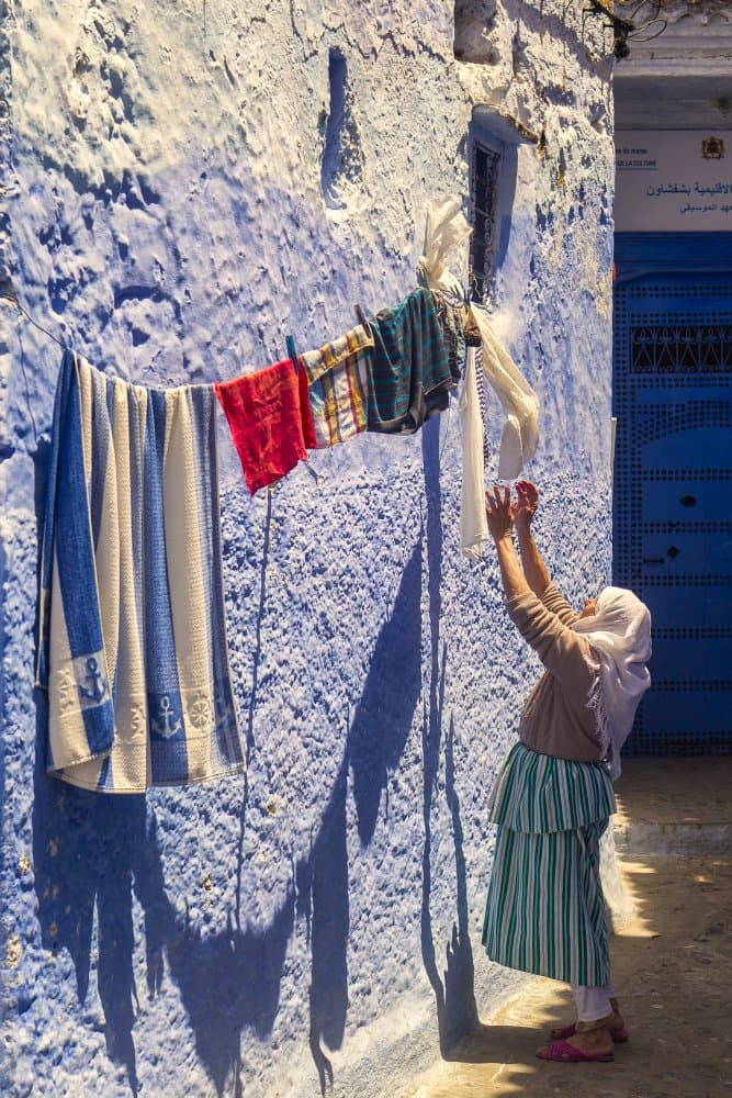 Chefchaouen Laundry Day by JUAN CARLOS HERVÁS MARTÍNEZ — canvas wall art