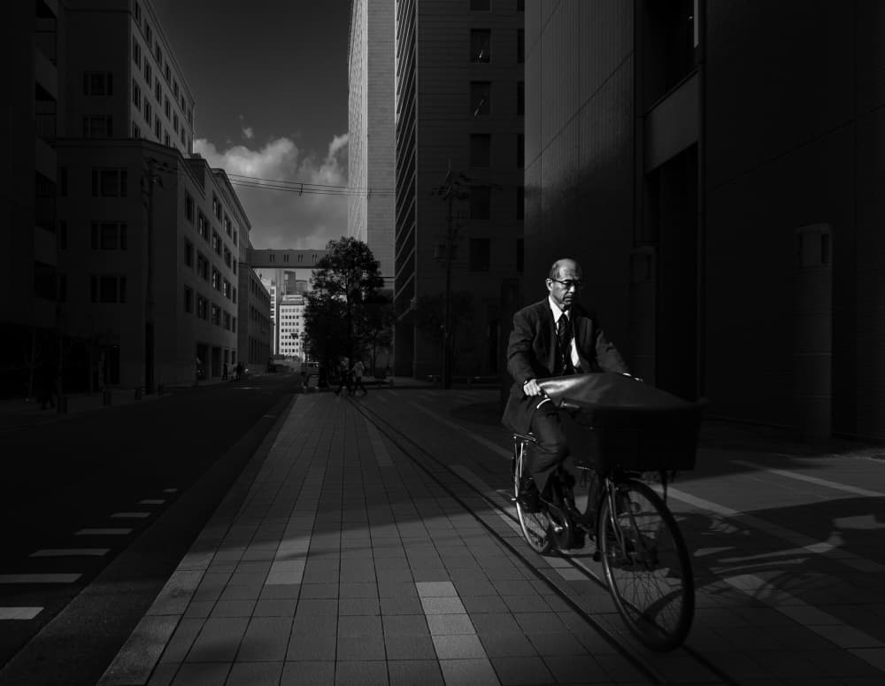 Man on City Bike by Yasuhiro Takachi — canvas wall art