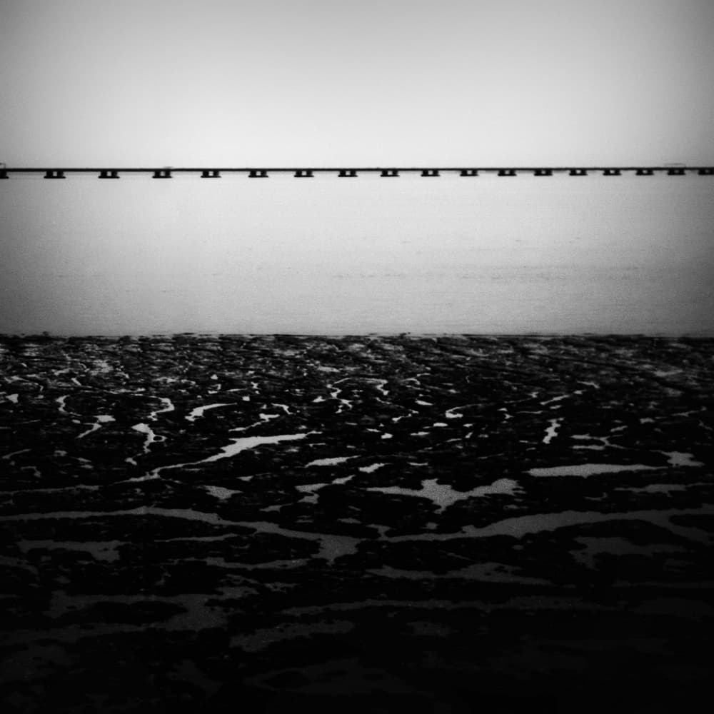 Pier Over Calm Water by Paulo Abrantes — canvas wall art