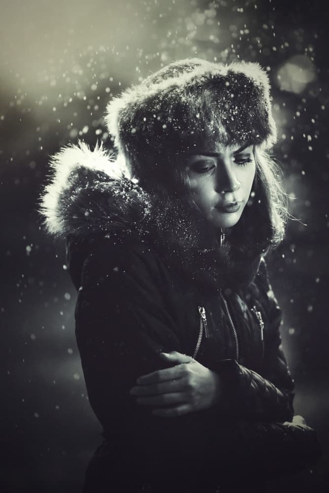 Pensive Woman In Snow by Ivan Lee — canvas wall art