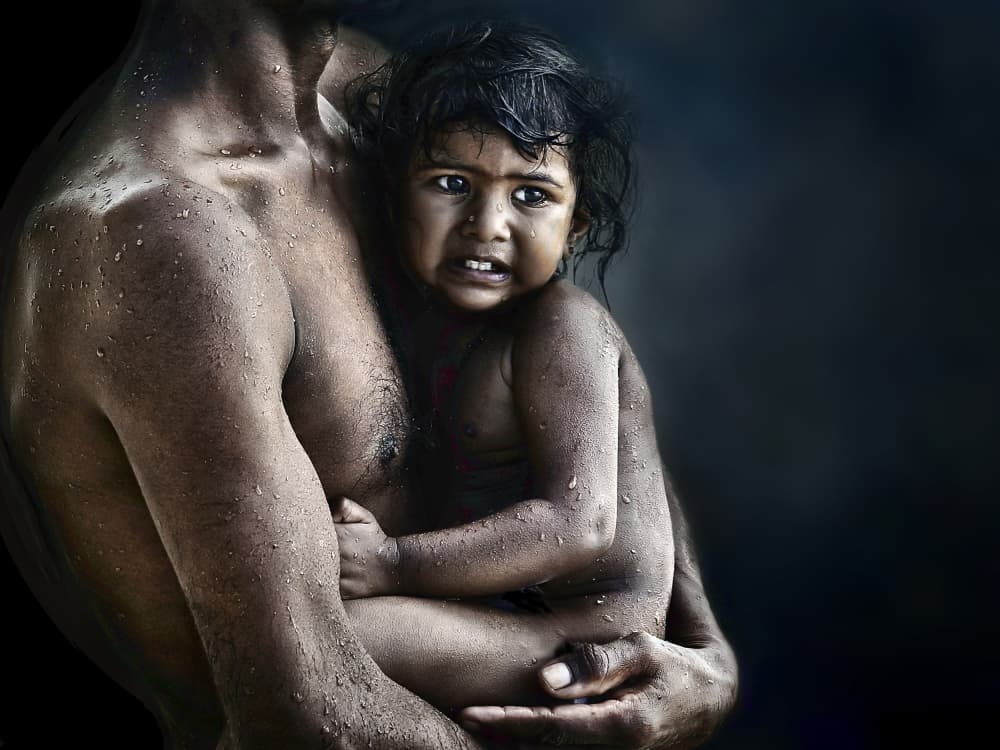 Father's Protective Embrace by Piet Flour — canvas wall art