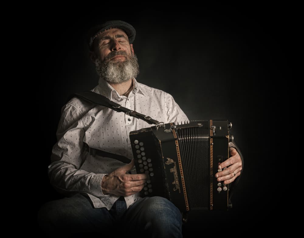 Soulful Accordion Player by Jonathan Power — canvas wall art