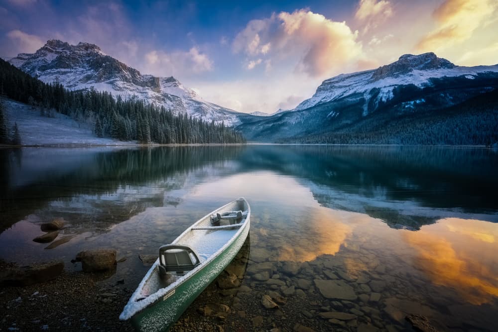 Snowy Mountain Lake Canoe by Yongnan Li （李永男） — canvas wall art