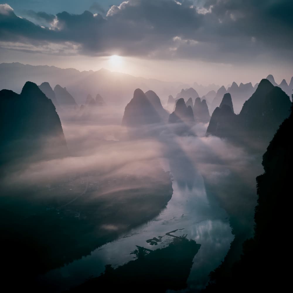 Sun Rays Over Misty Mountains by Fabrizio Massetti — canvas wall art