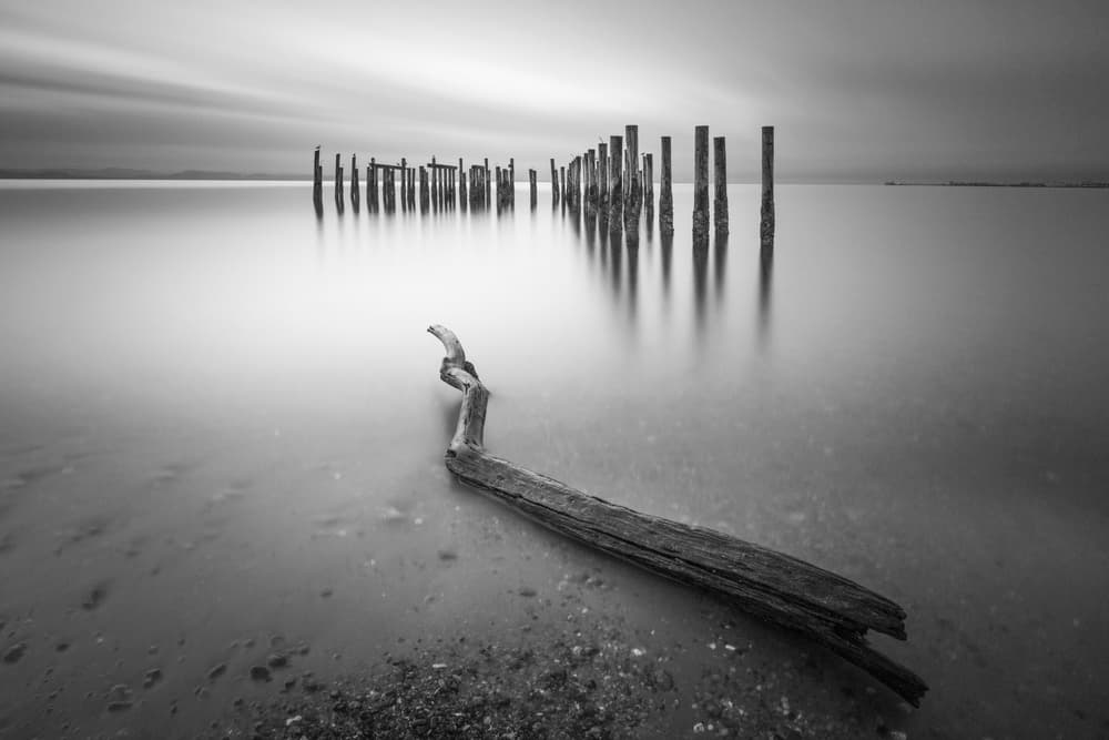 Calm Ocean Piers by Tony Xu — canvas wall art