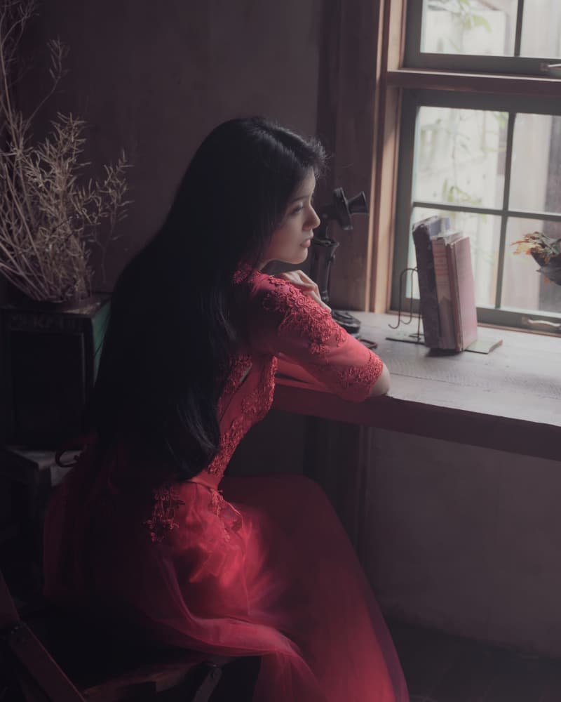 Woman In Red Daydreaming by Masayuki Kato — canvas wall art