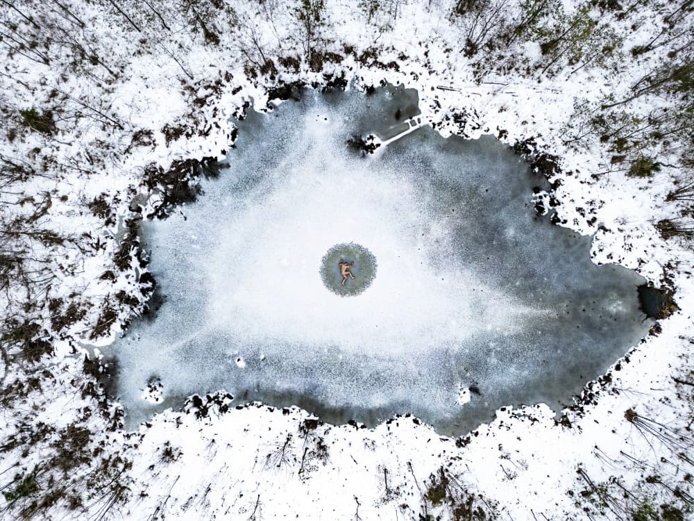 Solitude on Frozen Lake by Leszek Paradowski — canvas wall art