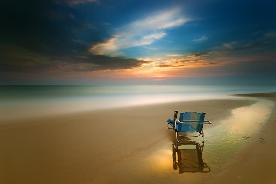 Calm Beach Chair Sunset by Rico Cavallo — canvas wall art