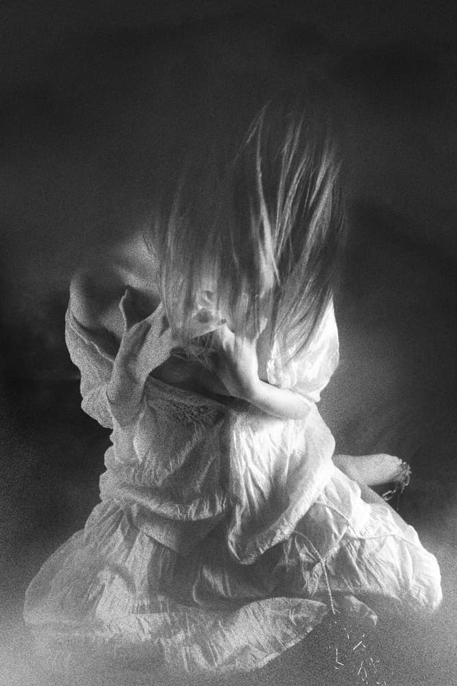 Hidden Woman Pensive by Eddie Wetton — canvas wall art