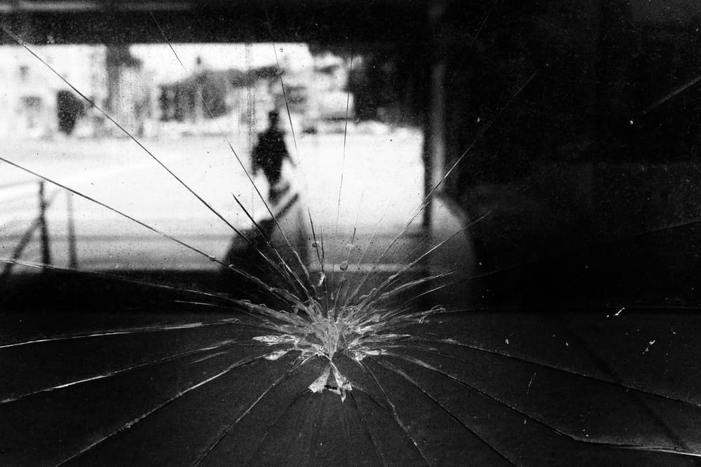 Figure Beyond Broken Glass by Riccardo Lucidi — canvas wall art