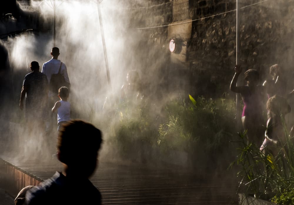 Misty Urban Glow by Caroline Bomers — canvas wall art