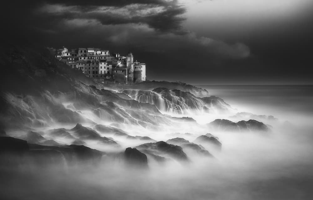Misty Coastal Village by Paolo Lazzarotti — canvas wall art