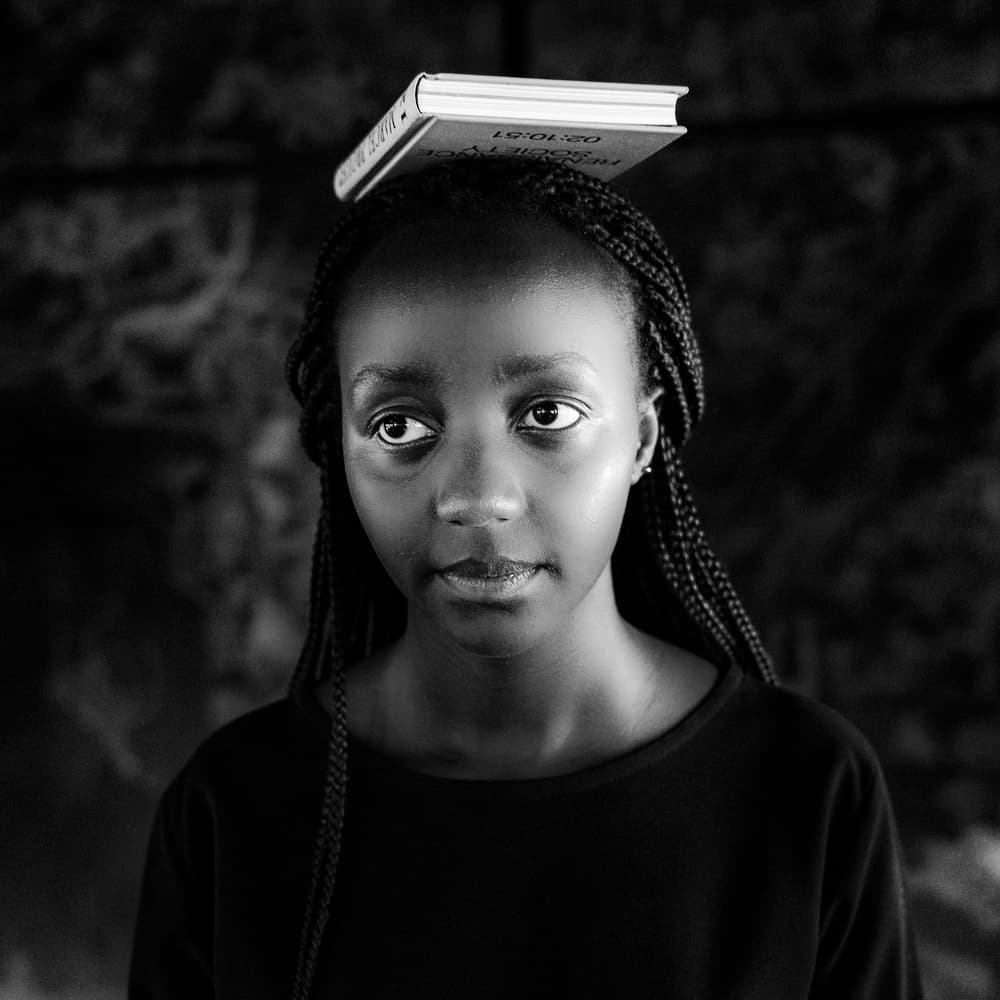 Focused Girl with Book by Andy Bauer — canvas wall art