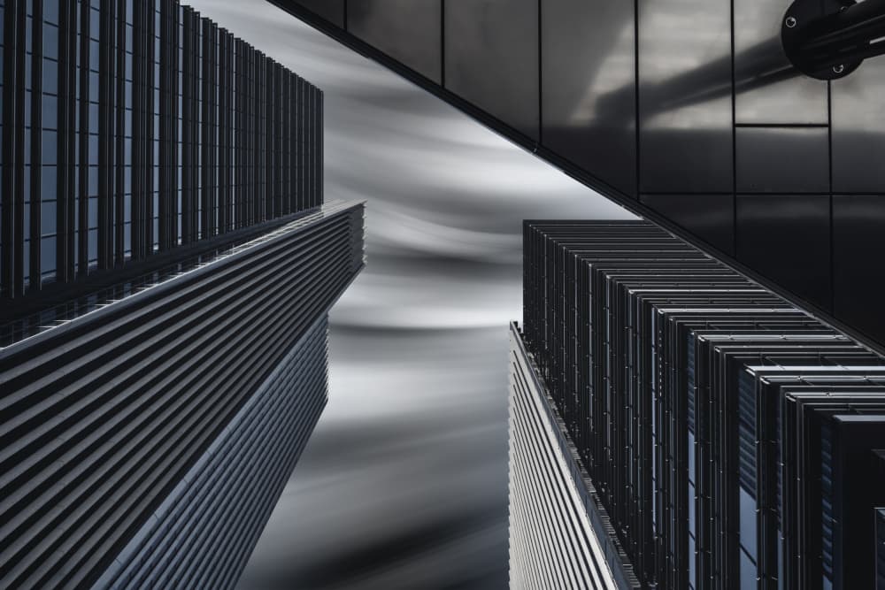 Sleek Skyscrapers Dynamic Sky by Tomoshi Hara — canvas wall art