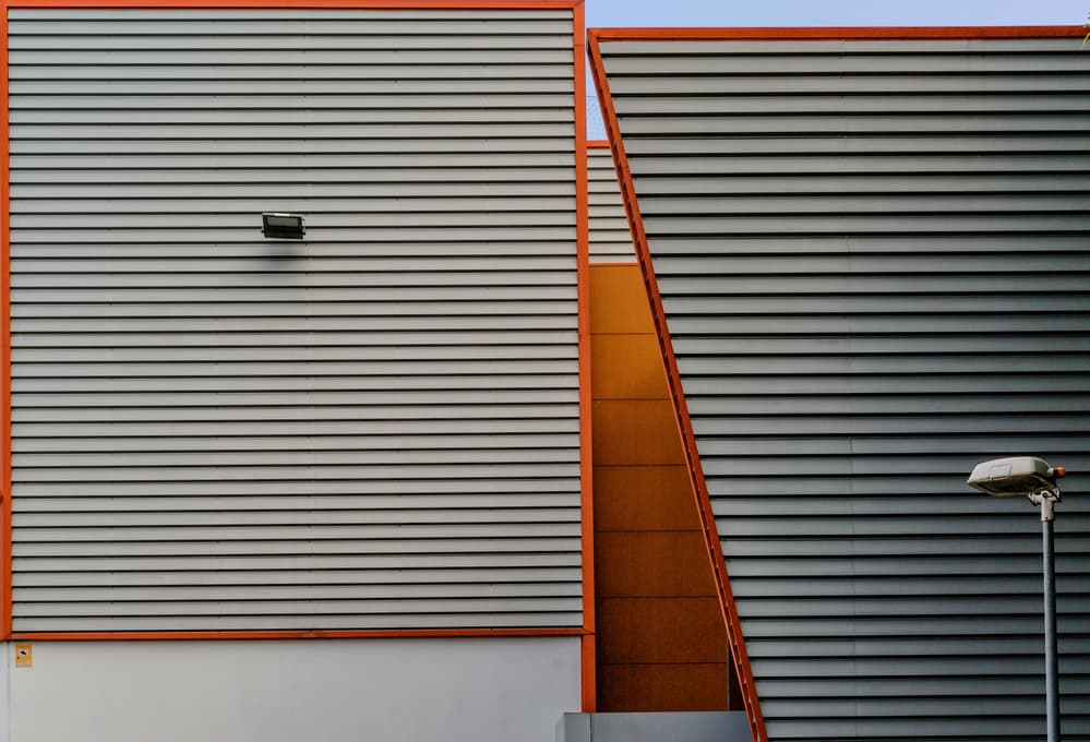 Geometric Orange Facade by Jois Domont ( J.L.G.) — canvas wall art