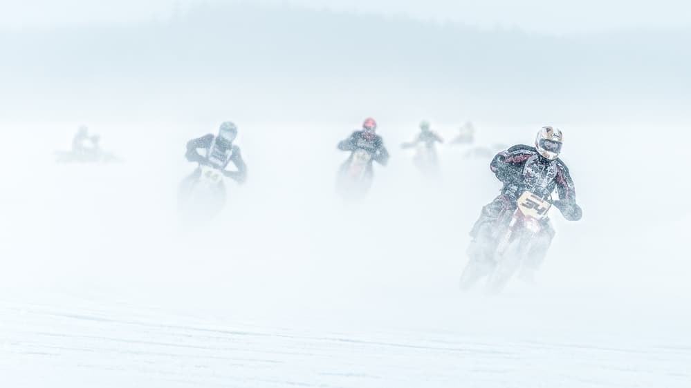 Snow Motorcycle Race by Petri Damstén — canvas wall art