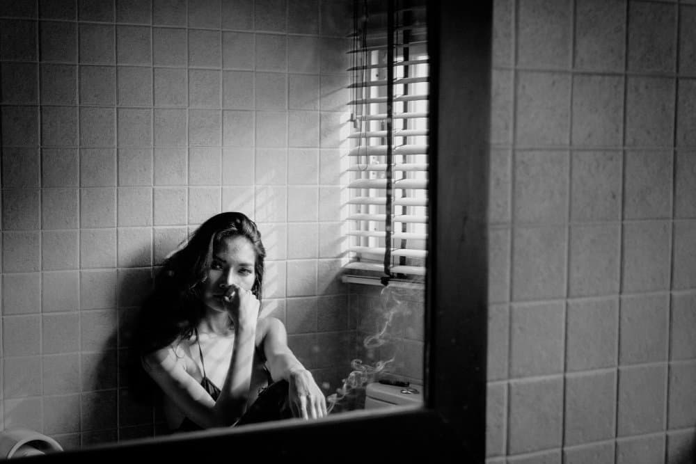 Pensive Woman Smoking by ADIREK M — canvas wall art
