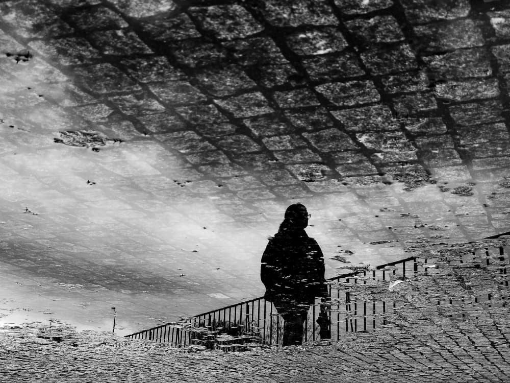 Solitary City Reflection by Miguel Silva — canvas wall art