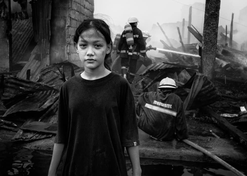 Girl Amidst Fire Aftermath by Shinji Isobe — canvas wall art
