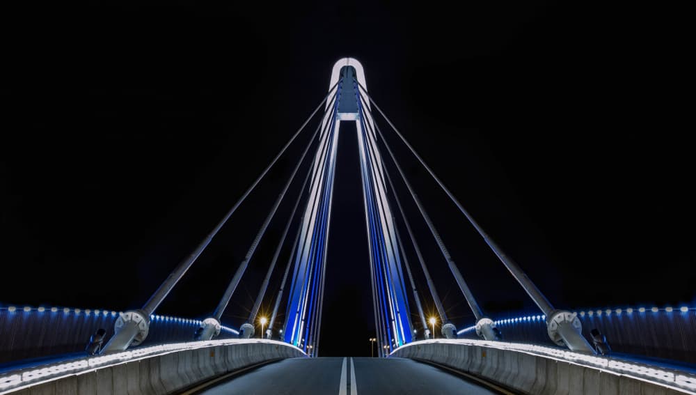 Blue Night Bridge by Wim Denijs — canvas wall art