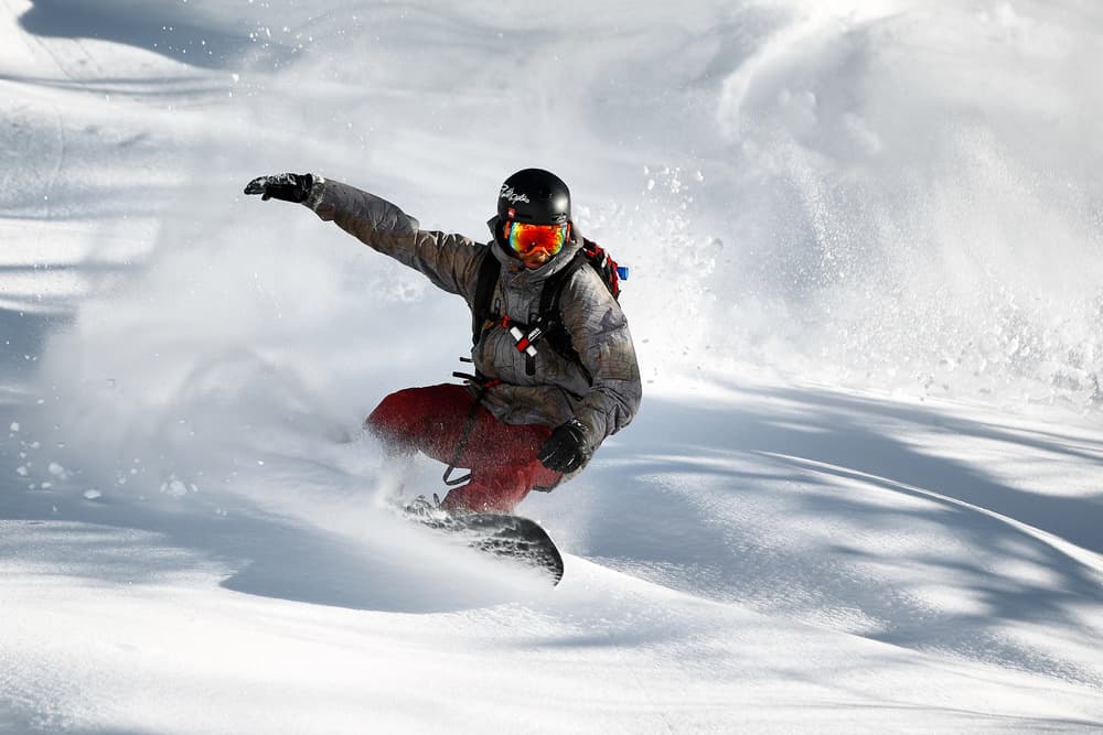 Dynamic Snowboarding Powder Turn by Jakob Sanne — canvas wall art