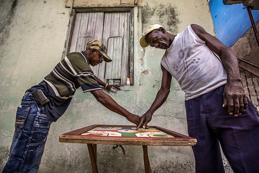 Men Playing Street Game by Avital Hershkovitz — canvas wall art