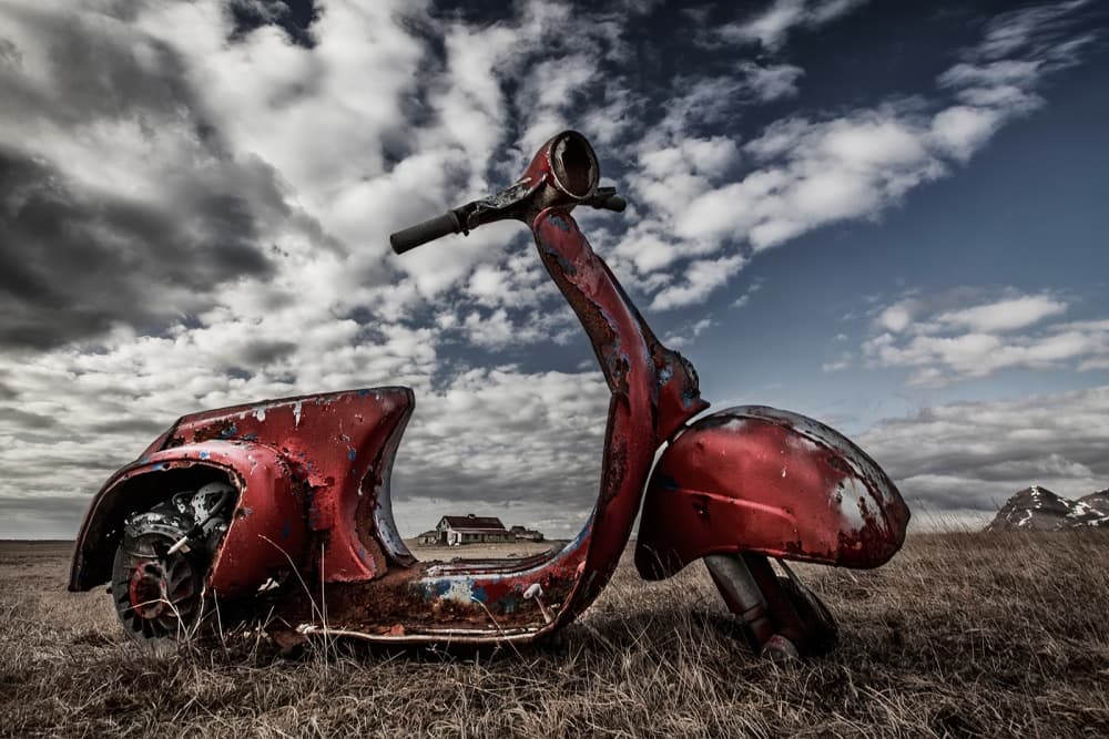 Rusty Red Scooter Landscape by Bragi Ingibergsson - BRIN — canvas wall art
