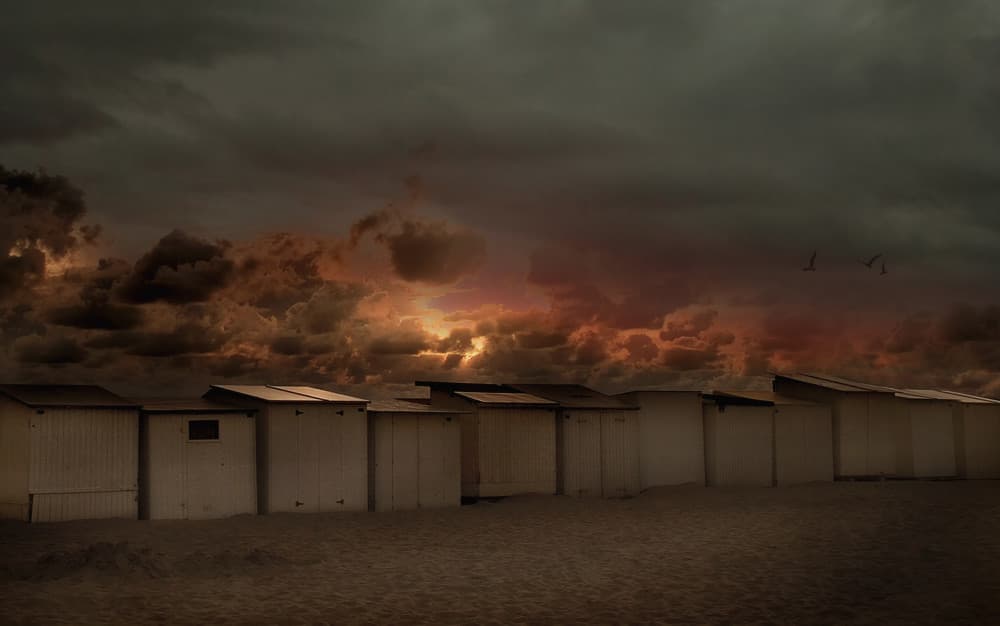 Stormy Beach Huts Glow by Yvette Depaepe — canvas wall art