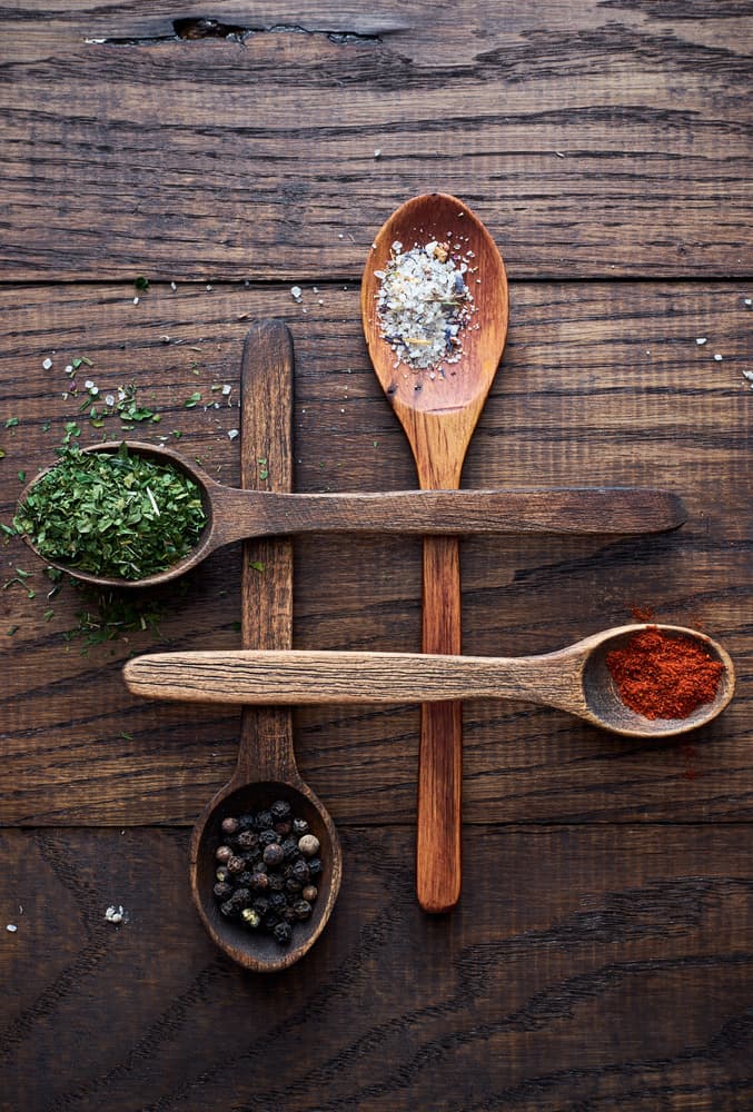 Culinary Spices On Wood by Karina Aleksandrova — canvas wall art