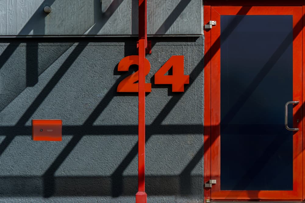 Red Door Geometric Shadows by Stephan Rückert — canvas wall art