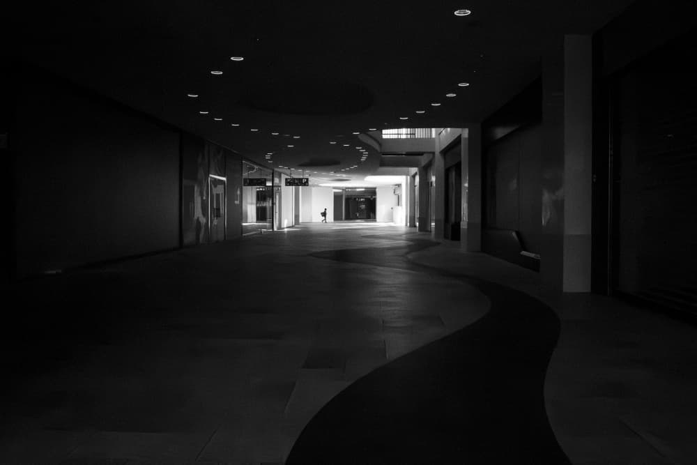 Empty Mall Lone Figure by Adam Dauria ☂ — canvas wall art