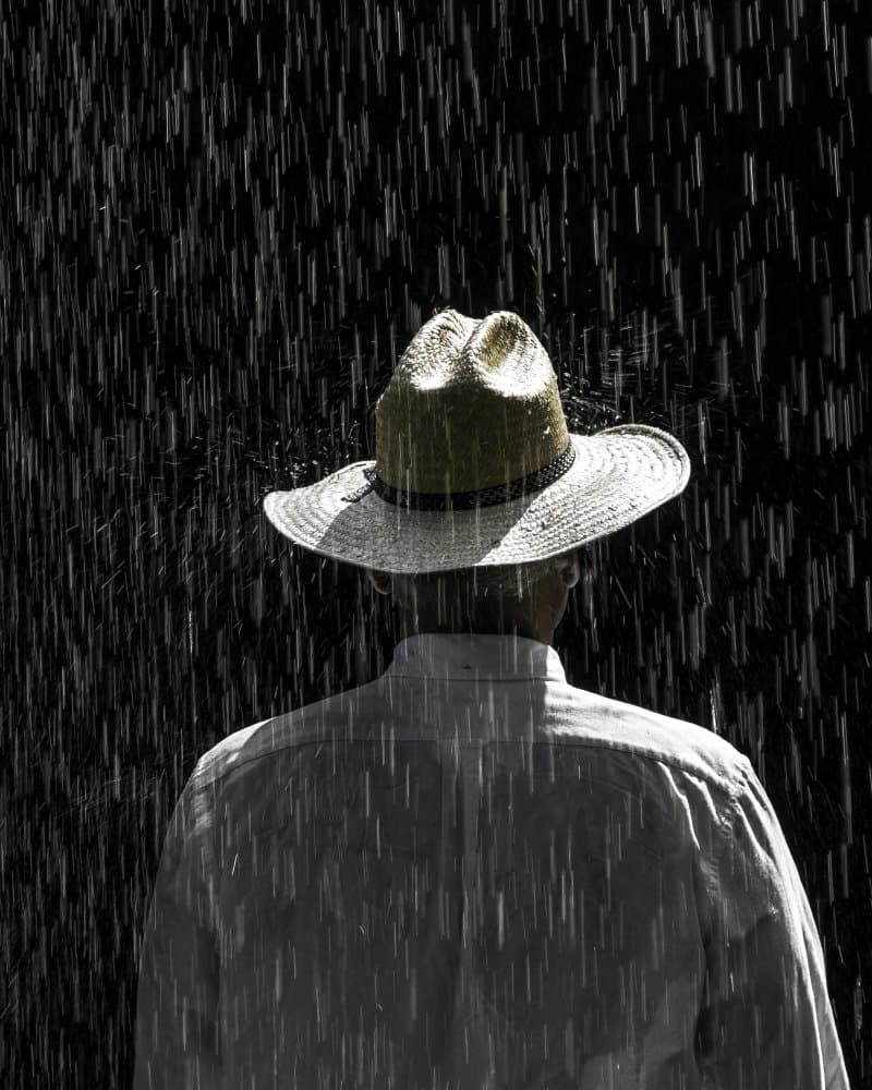 Man Standing In Rain by Karen Celella — canvas wall art