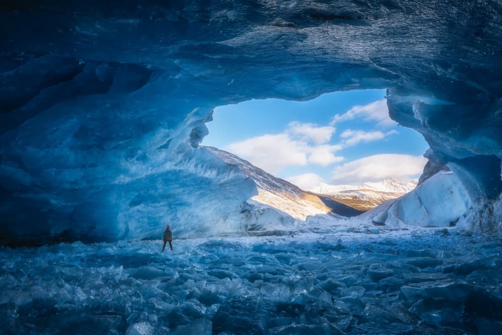 Blue Ice Cave Explorer by Yongnan Li (李永男) — canvas wall art