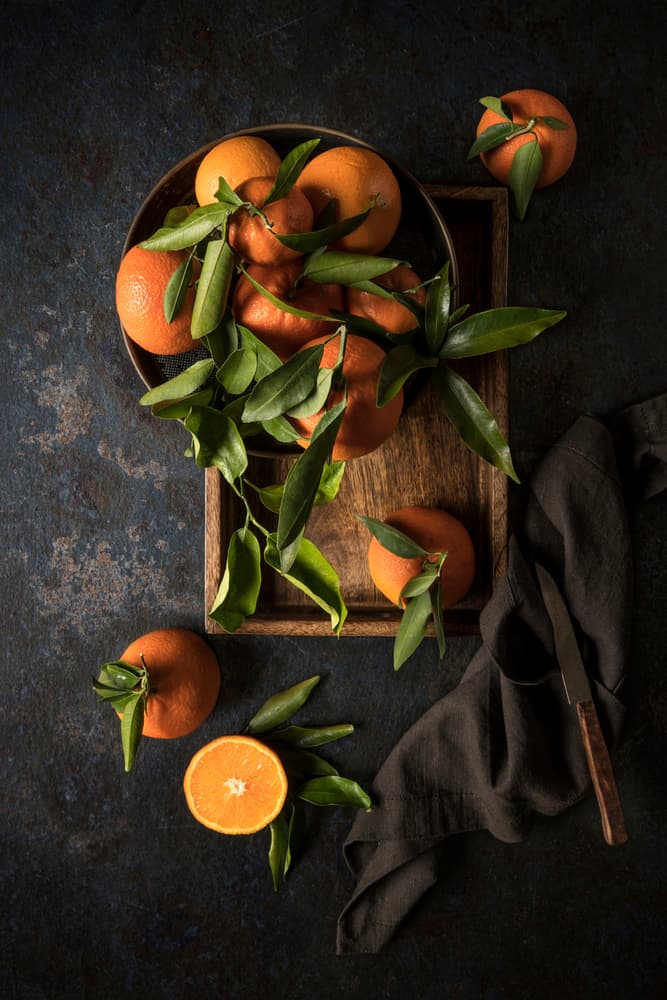 Fresh Moody Oranges by Diana Popescu — canvas wall art