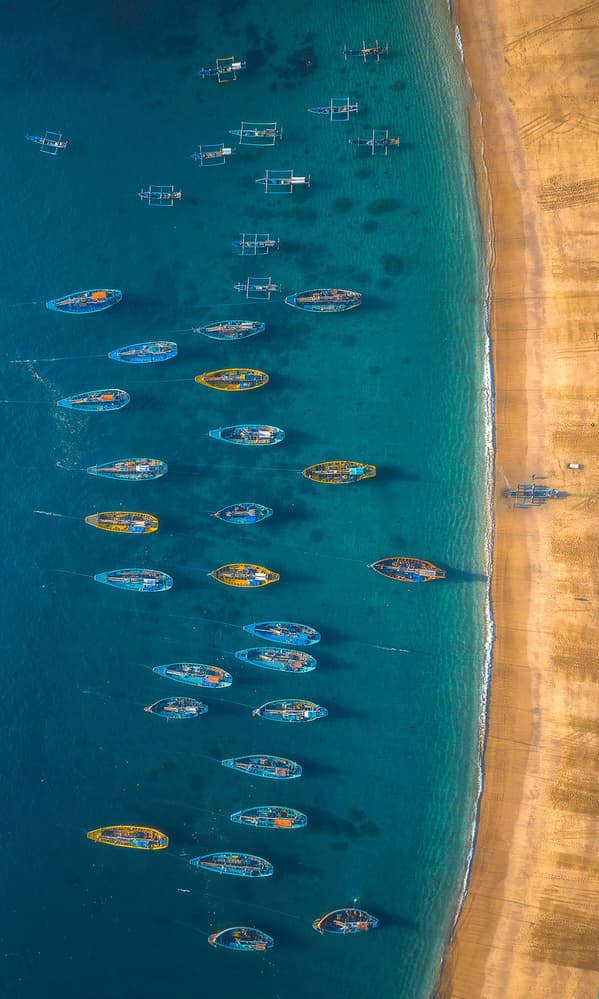 Colorful Boats on Tropical Beach by TIANQI — canvas wall art