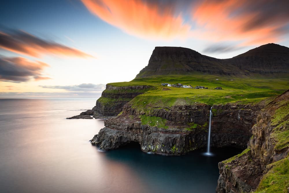 Dramatic Coastal Waterfall by Martin Steeb — canvas wall art