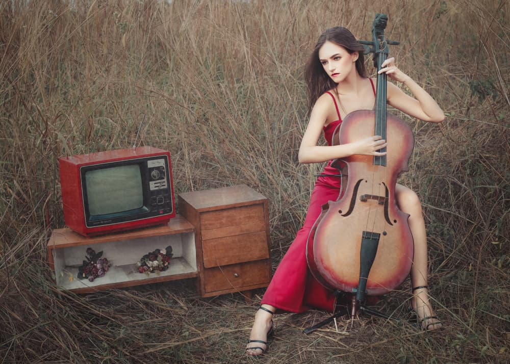 Red Dress Cello Player by Djayent Abdillah — canvas wall art