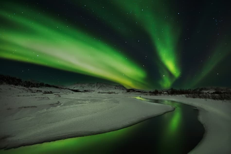 Green Aurora River Glow by Bragi Ingibergsson - BRIN — canvas wall art