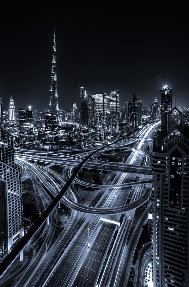 Dubai Night Skyline by Hasan Shaboot — canvas wall art