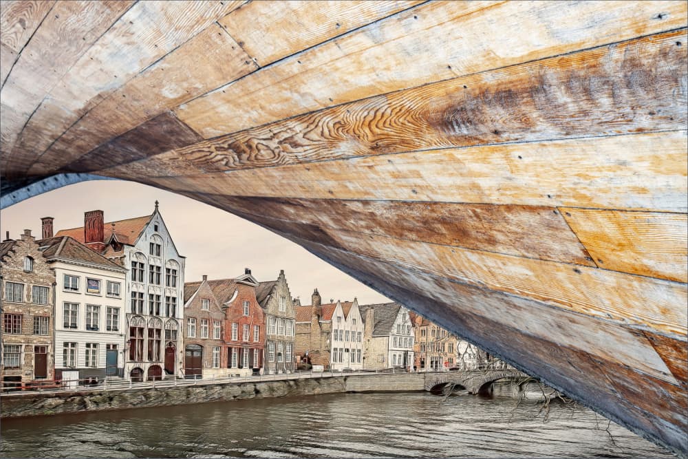 Under Bruges Canal Arch by Gilbert Claes — canvas wall art