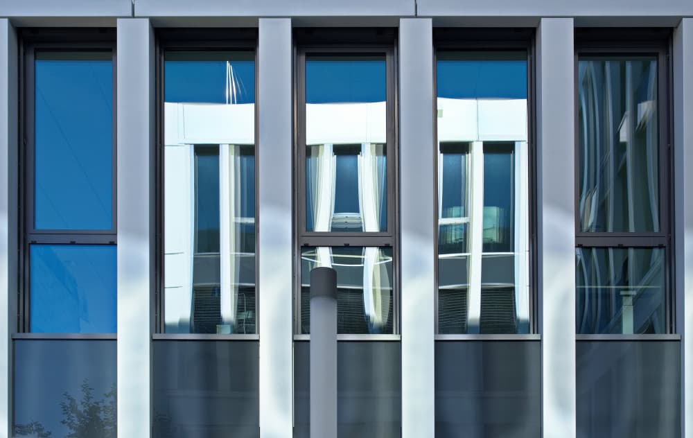 City Building Reflections by Hans Peter Rank — canvas wall art